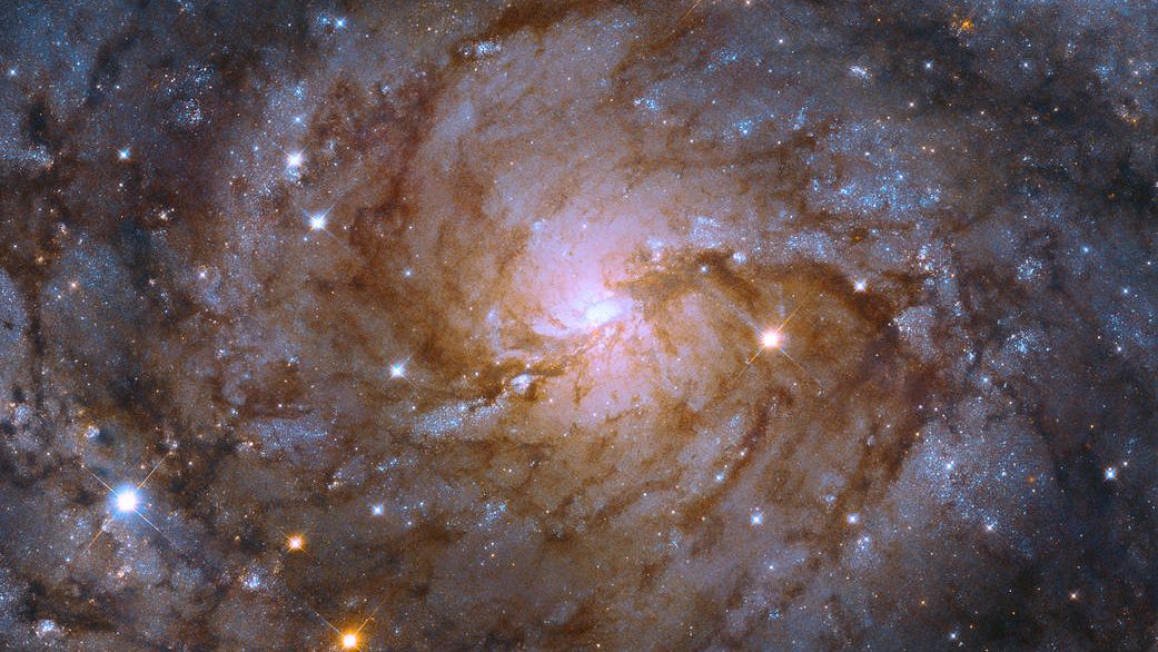 Il telescopio Hubble osserva la "galassia nascosta" dietro la Via Lattea