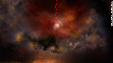 Questo è il concetto artistico di una stella di neutroni con un campo magnetico ultra forte, chiamato magnetar, che emette onde radio (in rosso). 